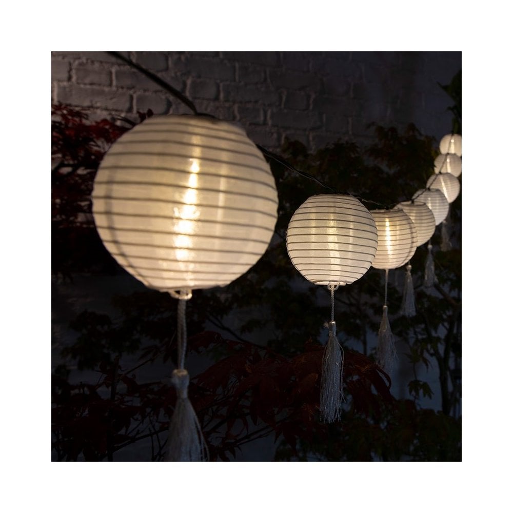 Outdoor solar string lights in circular lantern style.