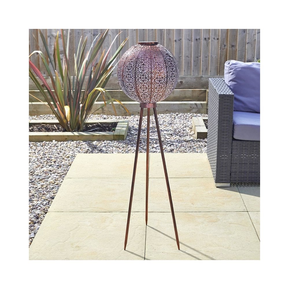 Outdoor solar floor lamp on a patio.