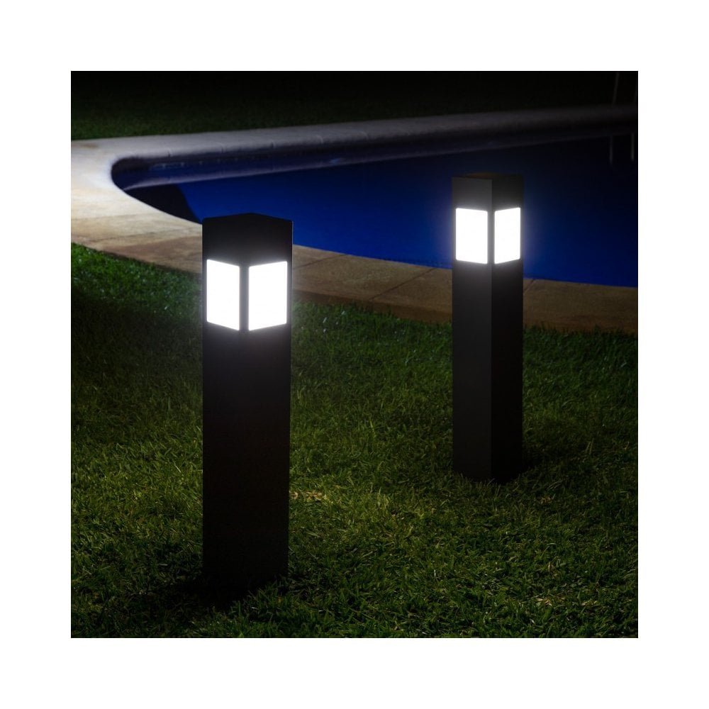 Outdoor square matte black solar pillar lights.